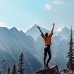 woman on mountain peak